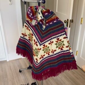 Multicolor Geometric Patterned Poncho with Fringe